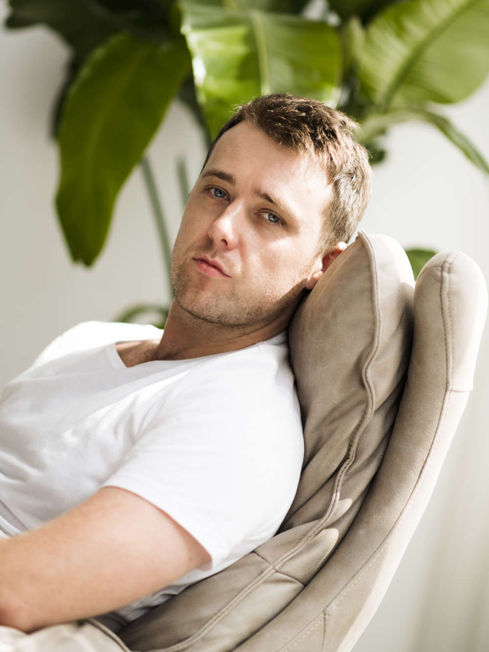 Lifestyle photo of a man on a chair