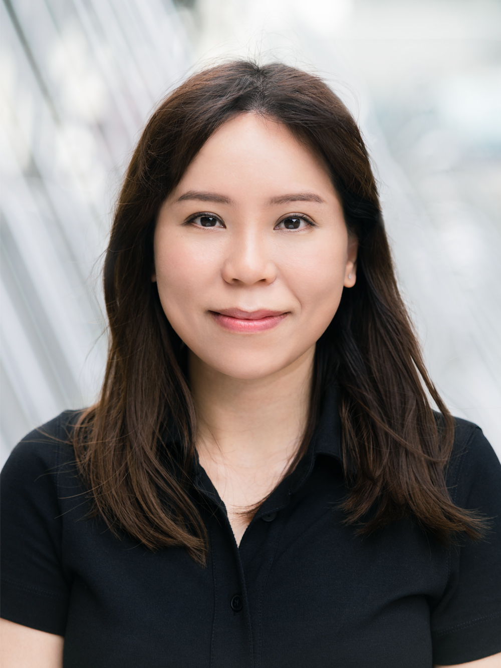 LinkedIn headshot of a business woman in Hong Kong